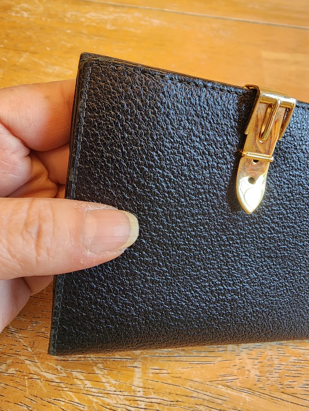 vintage Gucci black textured leather compact bifold wallet